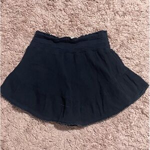 A layered black mini skirt